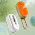 Mon ami à quatre pattes 3-in-1 electric pet steam brush showing the compact device with steam vents and ergonomic handle on a white background.