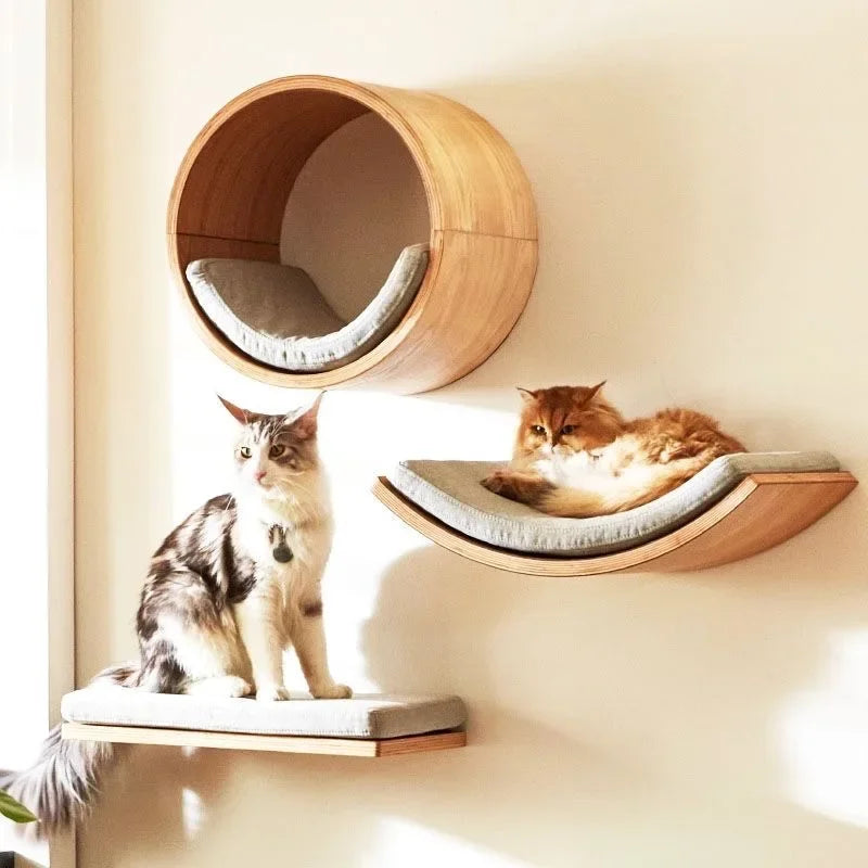 Wooden wall-mounted cat shelves by Mon ami à quatre pattes, featuring natural wood finish and multiple levels for feline climbing.