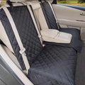 Waterproof dog car seat cover with armrest by Mon ami à quatre pattes, shown on car seat with protective material and armrest support.