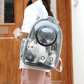Mon ami à quatre pattes capsule-style cat travel bag backpack showing mesh windows and adjustable straps for pet comfort.