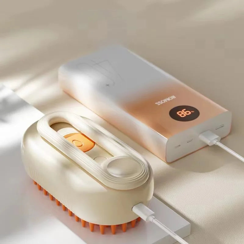 Mon ami à quatre pattes 3-in-1 electric pet steam brush showing the device with steam nozzle and pet grooming features.