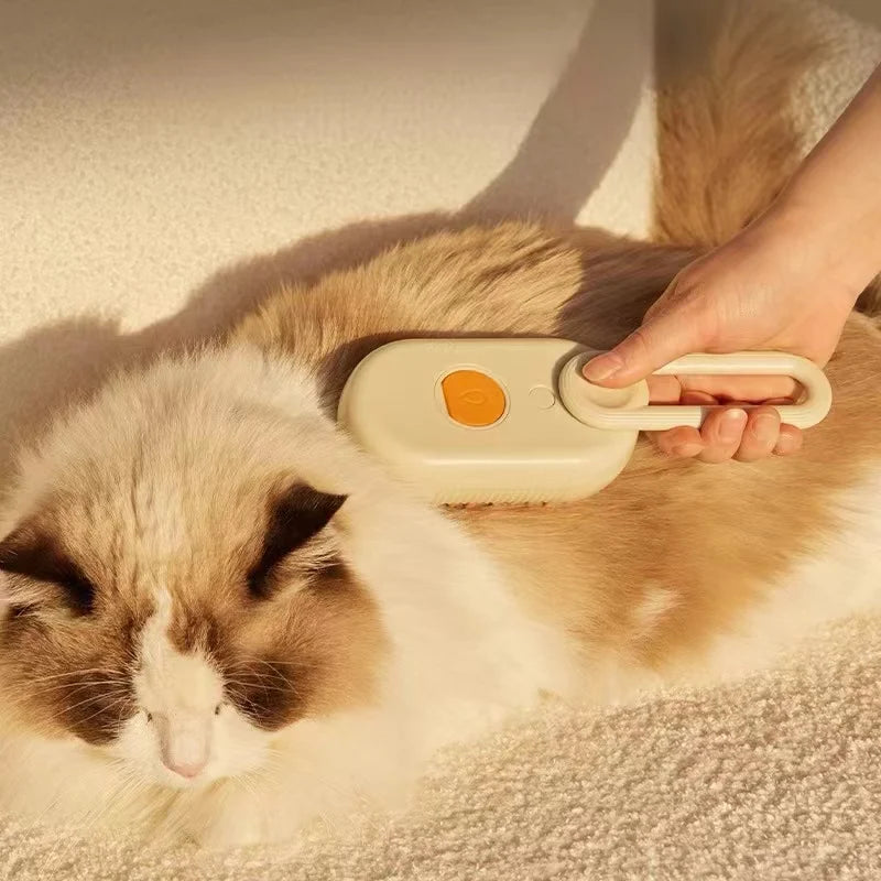 Mon ami à quatre pattes 3-in-1 electric pet steam brush with handle and steam vents, designed for grooming pets effectively.