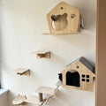 Wall mounted wooden cat shelves by Mon ami à quatre pattes, featuring natural wood finish and multiple levels for feline lounging.