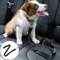 Dog car seat belt with bungee shock absorber by Mon ami à quatre pattes, shown secured in a vehicle for safety and comfort.