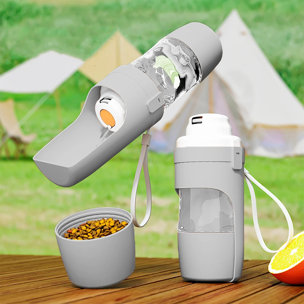 Portable dog water bottle with food container from Mon ami à quatre pattes, featuring a compact design with a water dispenser and food storage.