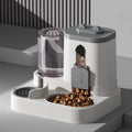 Large capacity cat feeder with water bowl from Mon ami à quatre pattes, featuring food storage compartment and integrated water dish.