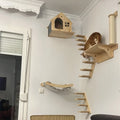 Wooden wall-mounted cat shelves by Mon ami à quatre pattes, featuring natural wood finish and multiple levels for feline perchings.