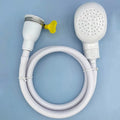 Pet bathing shower sprayer for dogs and cats from My Four-Legged Friend, showing a handheld spray nozzle with water streaming.