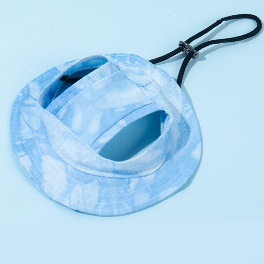 Pet hat with ear holes for dogs and cats, soft fabric, designed by Mon ami à quatre pattes, shown on a pet.