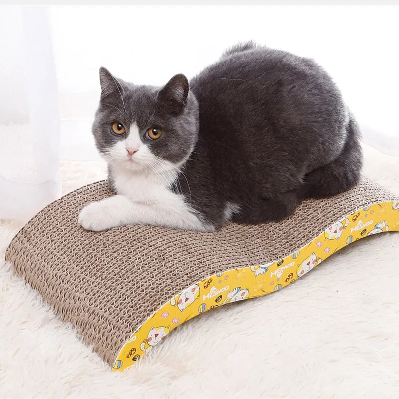 Cardboard cat scratcher sofa bed by Mon ami à quatre pattes, showing a cozy, foldable scratching and resting surface for cats.